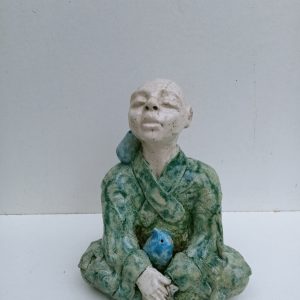 Moine tibétain assis