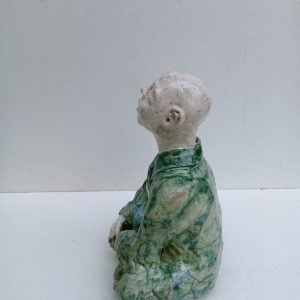 Moine tibétain assis